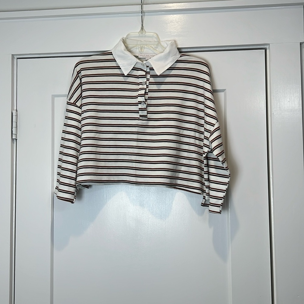 Don’t ask why brand crop top shirt. One size fits most.